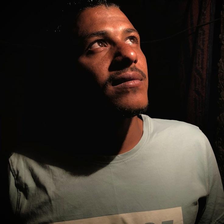 Alex Morgan, Lead Design Curator at Ivory Crest Trail, reviewing corporate floral arrangements